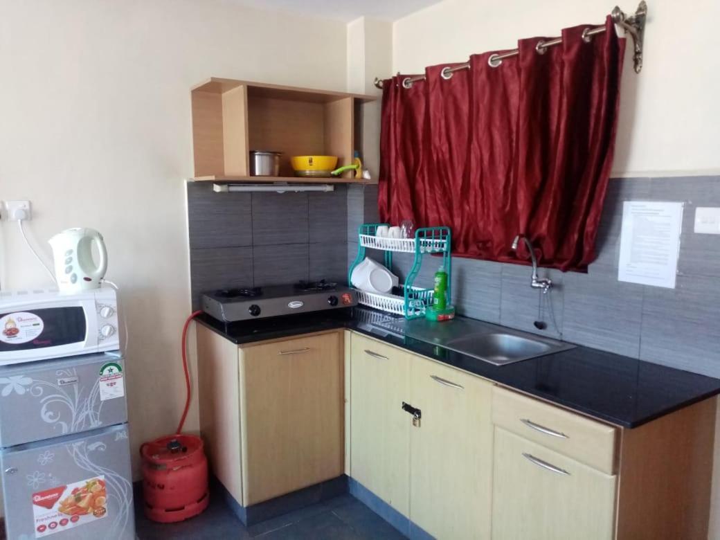 نيروبي Kim Suites - Mvuli Studio Apartment المظهر الخارجي الصورة